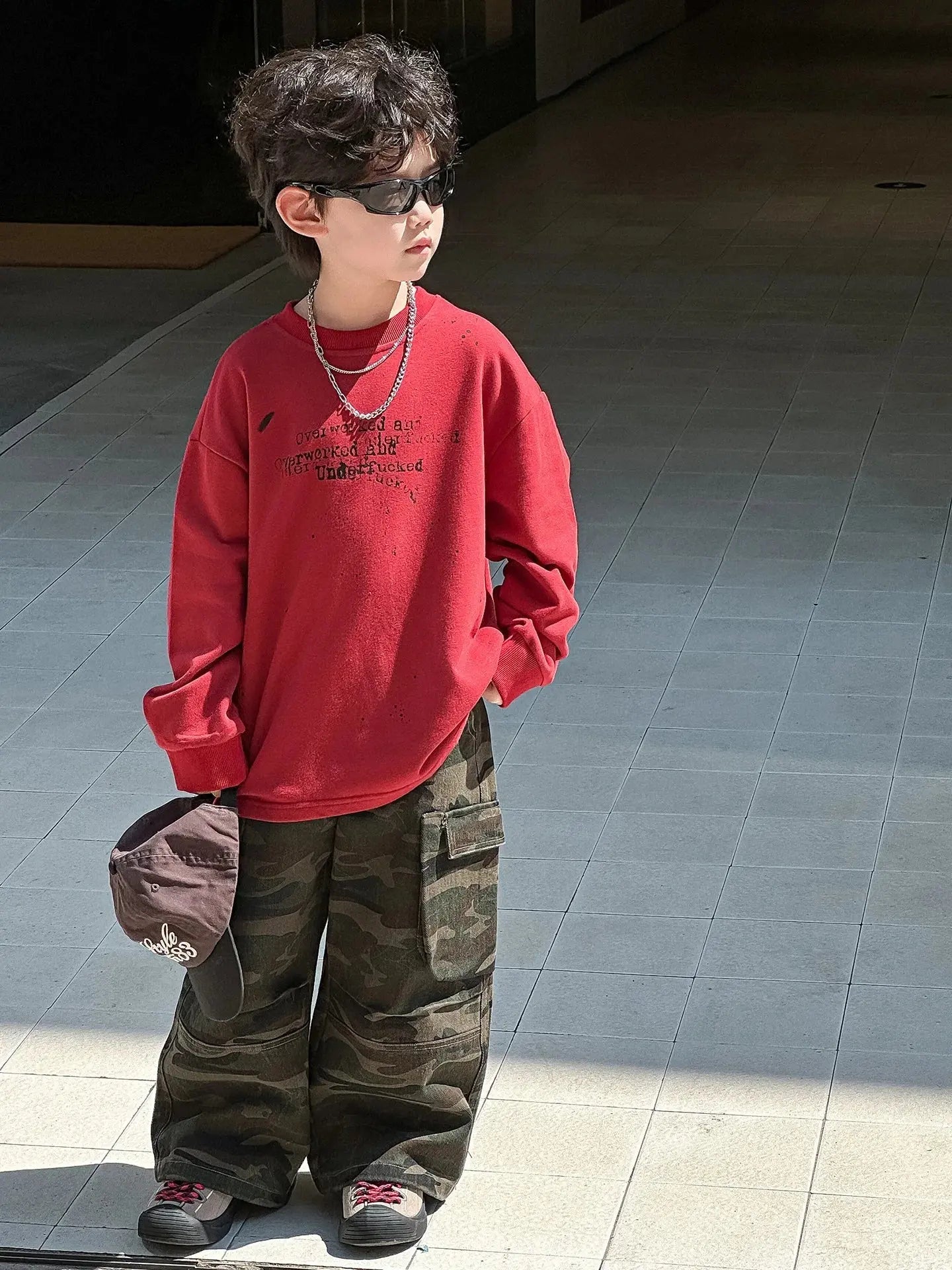 Otoño nuevos niños guapos pantalones casuales de pierna ancha 2025 ropa para niños niños moda todo fósforo pantalones Cargo de camuflaje - SYN PERU