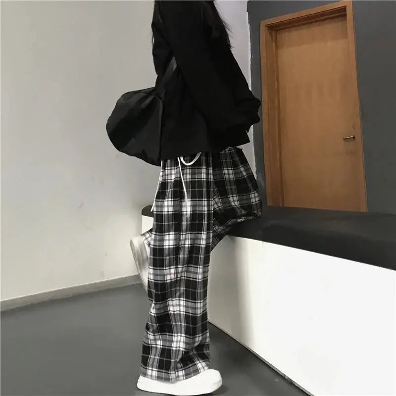 Pantalones de chándal de gran tamaño para mujer, pantalón informal a cuadros negros, holgado, con bolsillos de cintura elástica, Hip Hop, Unisex - SYN PERU
